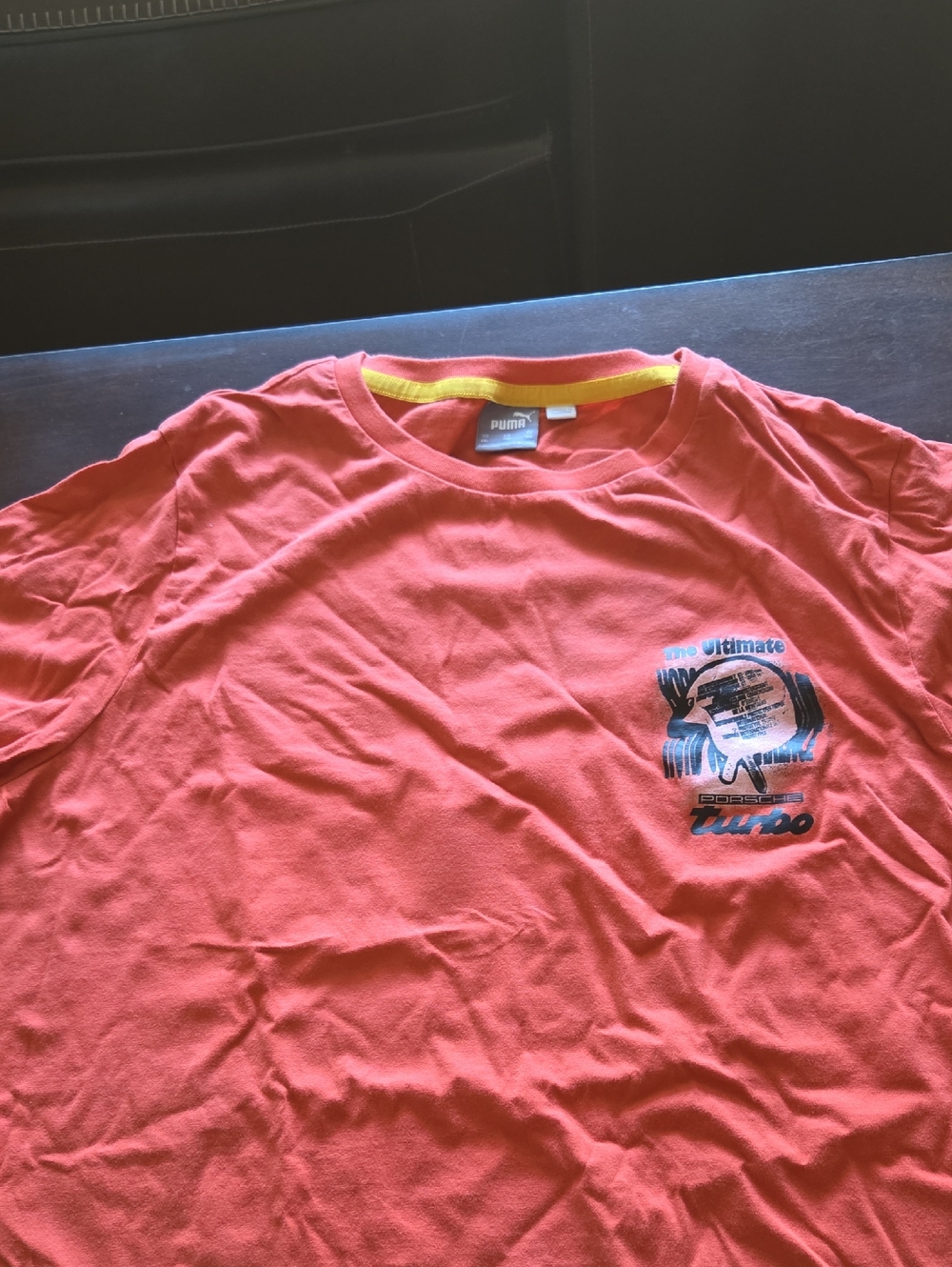 Puma Coral Tee with Yellow Neck Trim and Blue Graphic Porsche Puma Legacy